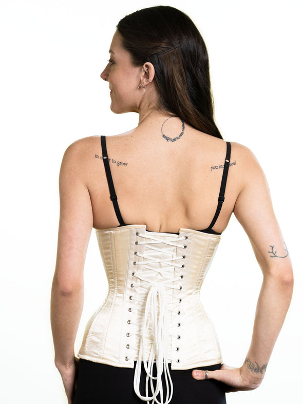 curvy longline corset in ivory for everyday corset wear also great for a wedding and bridal corset back lace up view shown