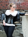 Model wearing a leather jacket and our underbust 426 longline steel boned waist training black corset top