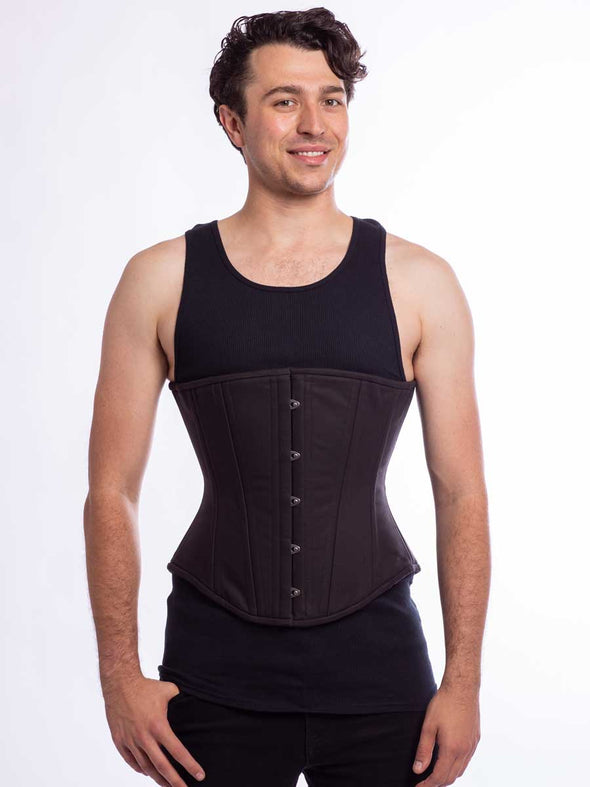 Male model wearing the modern curve cs 701 corset in black cotton