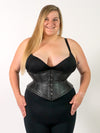 Product shot of a Curvy plus sized model wearing a black bra and black leggings and a leather cs-201 hourglass curve corset