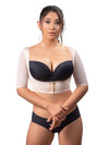 Model wearing an upper arm shaper and back bulge smoother in beige with sleeves and an open bust