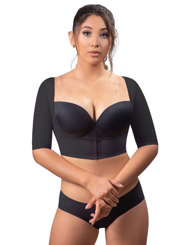 Model wearing an upper arm shaper and back bulge smoother in black with sleeves and an open bust