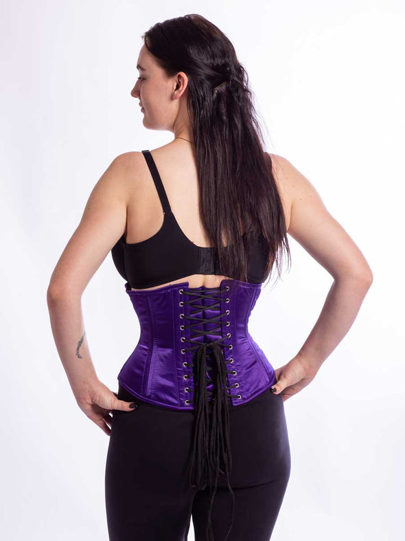 Model wearing the CS411 in design color purple satin back view