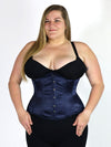 curvy plus size model wearing a black bra and leggings with a navy satin longline corset