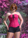 front product picture of Travel to your favorite movie set with this limited edition Magenta Pink Cotton Hourglass Curve Longline Overbust Barbiecore Corset! Show off your signature magenta pink style and get ready to explore the PNW with the Adventure Dolls!