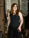 glamourous model wearing a pinstripe hourglass curve overbust corset top with black pants and a sparkly pendant