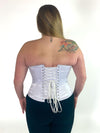 plus size corset model wearing a Orchard corset cs-530 overbust corset top in white satin with black leggings back lace up corset view