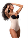 Model wearing a beige nude latex Vedette fajas colombianas shapewear and black bra