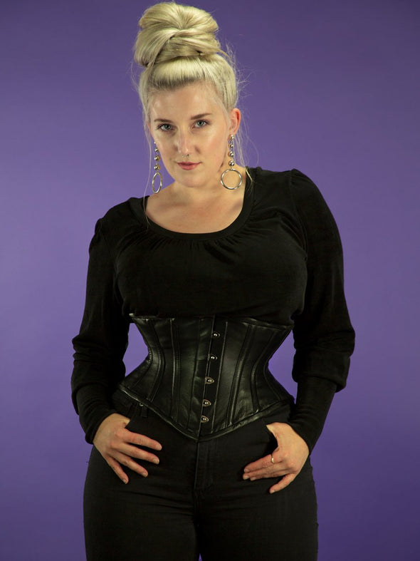 Model wearing the plus size 201 leather steel boned corset front view