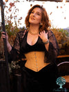 Model wearing cs201 waspie hourglass curve corset over black velvet jumpsuit and lace duster