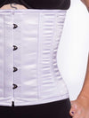 Detail front view of a Cute athletic build model wearing a modern curve corset in white satin with black leggings and black bra