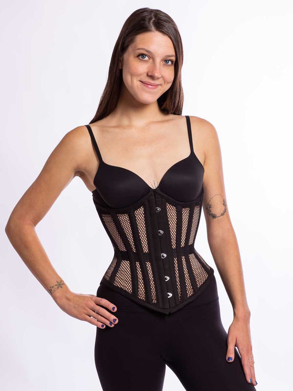 Smiling model wearing the cs 345 black mesh corset 