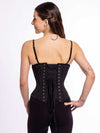 back lace up corset view of a cute corset model wearing black leggings and black bra with a black pinstripe everyday corset that can be worn for fashion or waist training