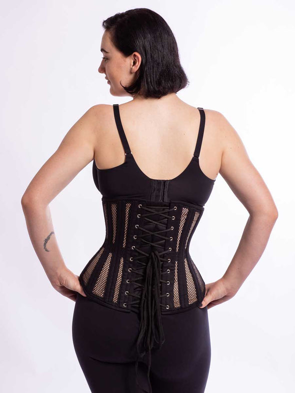Model wearing the romantic curve cs 411 longline corset in black mesh back lace up view