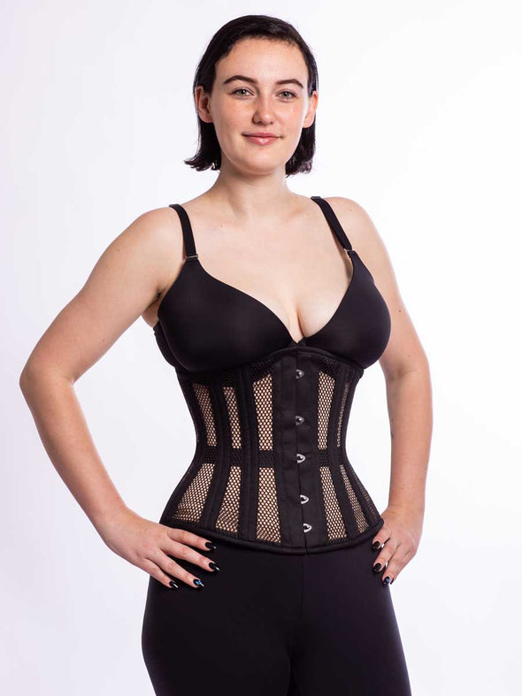 Model wearing the romantic curve cs 411 longline corset in black mesh