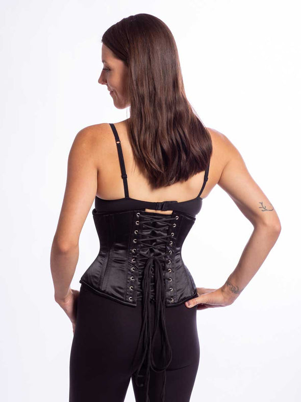 Model wearing the CS411 in design color black satin back view