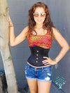 411 romantic curve black satin waist trainer corset shown on model with shorts and sunglasses