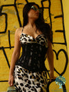 Model wearing the  romantic curve cs411 in black mesh over an animal print dress.  graphiti back ground in yellow and black.