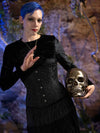Model with short purple hair wearing the cs 411 longline romantic curve corset in a black brocade.  Corset is worn over a black velvet dress and the model is holding a gold skull.