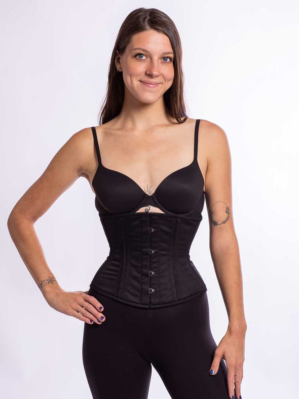Model wearing the cs411 standard corset in comfortable black cotton
