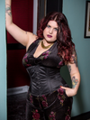 Model wearing black satin cs411 steel boned corset