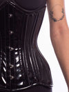 Close up of underbust 426 longline in black pvc to show shine