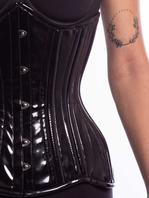 Close up of underbust 426 longline in black pvc to show shine