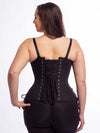 Model wearing the cs426 longline black cotton corset with hip ties back lace up view
