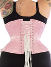 Model wearing our plus size 426 with hip ties steel boned waist training corset in pink satin from the rear