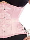 Close up of a model wearing our plus size 426 with hip ties steel boned waist training corset in pink satin