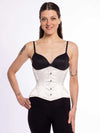 cute corset model wearing an ivory satin everyday corset for waist training over a black bra and black leggings