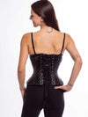 Smiling model wearing the cs426 hourglass curve corset in shiny black latex pvc back lace up detail