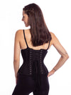 smiling model wearing the cs426 standard corset in black mesh back lace up view