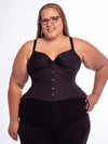 Curvy plus size model wearing the cs426 in black cotton with hip ties paired with black leggings and a black bra