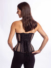 Cute model wearing the cs 511 overbust corset top in black cotton mesh back lace up view