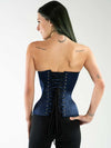 Rich navy satin corset top with boning worn with black leggings showing the back lace up view