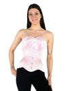 Smiling model wearing a pale pink strapless corset top over black leggings