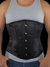 model wearing the 701 plus size longline mens steel boned corset black satin front view