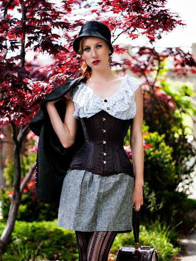 Model wearing our 426 longline in black satin with a grey skirt