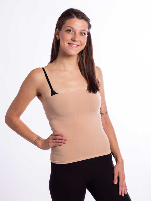 Front view of a model wearing the beige longline bamboo liner in an overbust style for corset tops