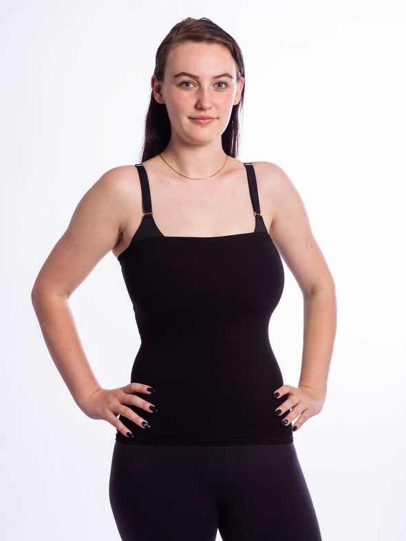 Model wearing a longline seamless bamboo black corset liner as an overbust corset top liner