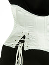 Close up of the hip ties of the 426 with hip ties in white satin