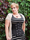 model wearing the plus size 345 black cotton with snaps steel boned corset