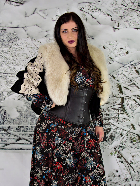 Holiday model wearing the plus size 411 lamb leather steel boned corset