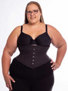 curvy plus size model in the 201 cotton waspie corset wearing black leggings and black bra